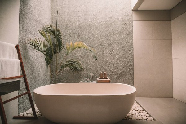 What's the Best Way to Incorporate Natural Stone Features into a Modern Bathroom?